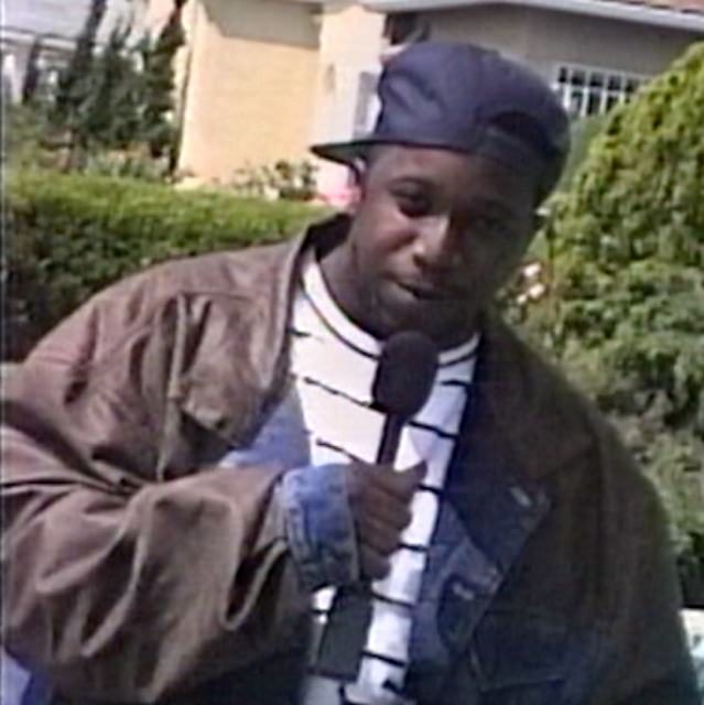 Kool G Rap with the authenticated Shure V64 wireless microphone